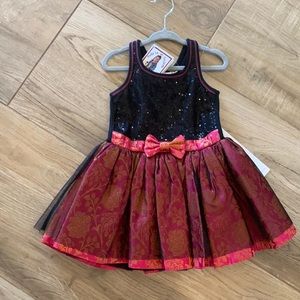 Pretty formal dress for a special occasion. Red and black